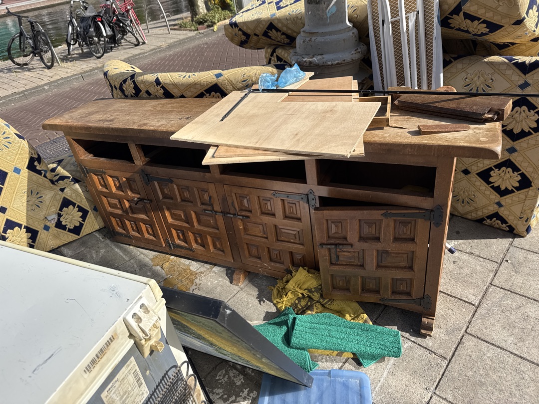 Wooden console, needs a bit of fixing but looks great. And a freezer (questionable smell) 2