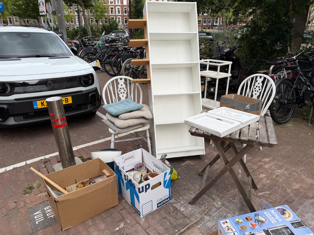 Bookcases,
Table and chairs and cushions,
Flower pots,
Ikea bed table 1