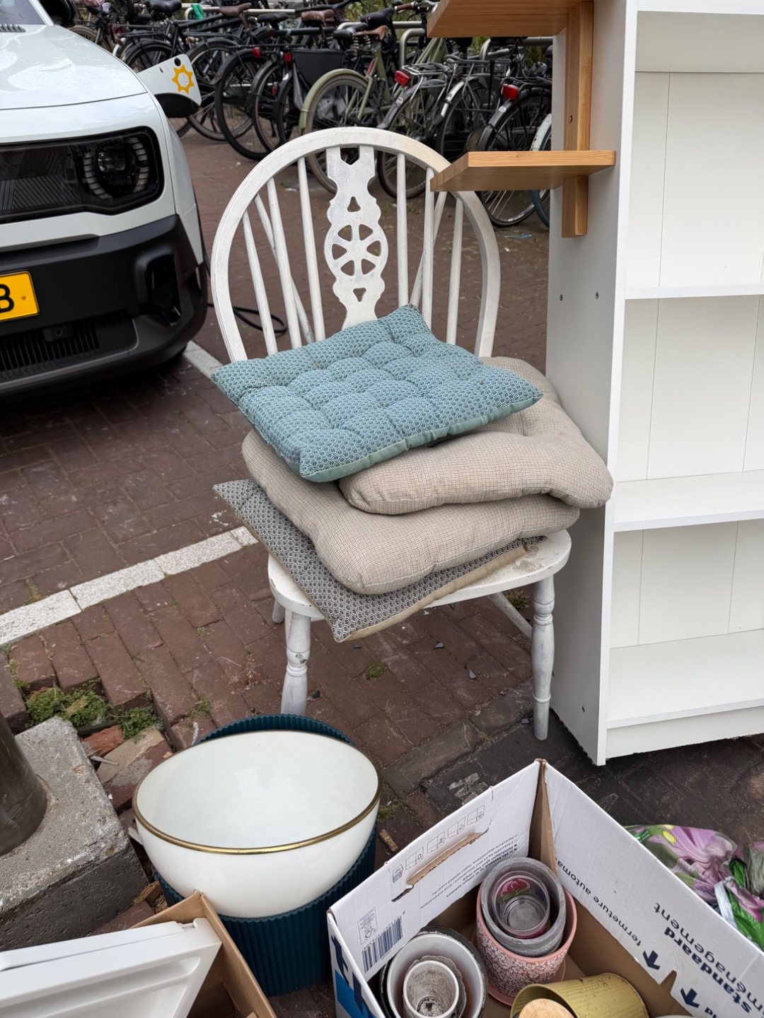 Bookcases,
Table and chairs and cushions,
Flower pots,
Ikea bed table 3