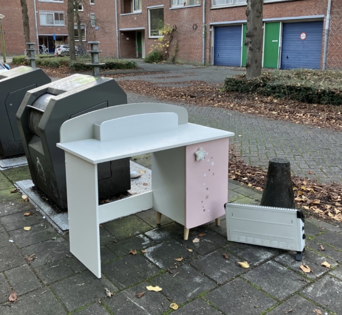 Bulky waste next to garbage containers in Amsterdam